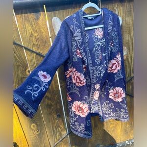 ADORE, lightweight coat with hood and pockets. Beautiful detail embroidery